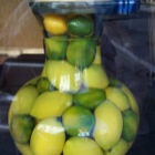 Vase with lemons
